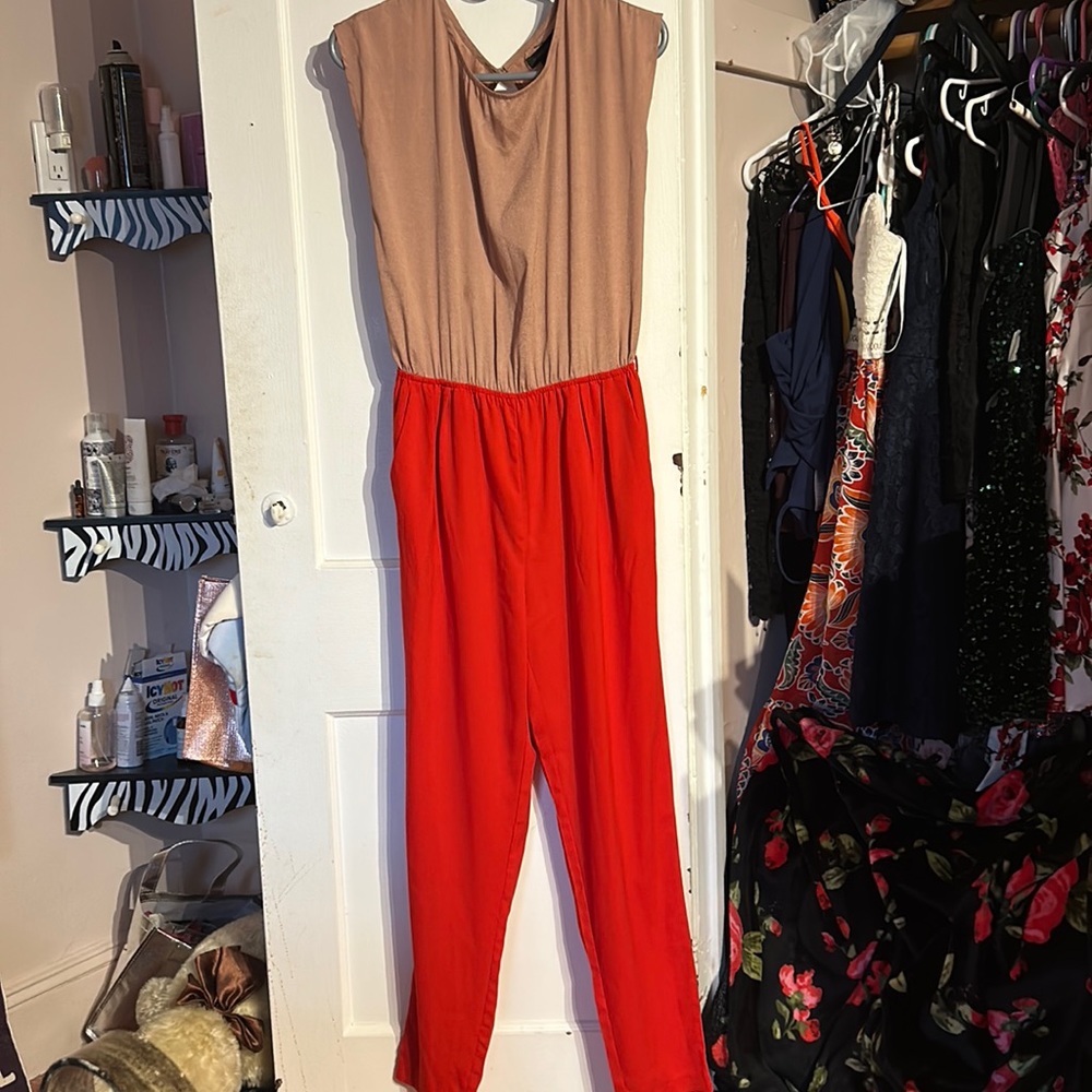 Jealous Tomato small size jump suit! Brand new condition. Never worn.